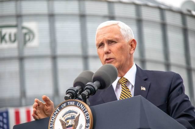 US-NEWS-PENCE-TOUTS-BENEFITS-OF-TRADE-1-1AT.jpg